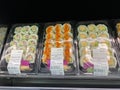 Fresh and handmade Sushi in the refridgerated aisle of a Sams Club grocery store ready to be purchased by consumers