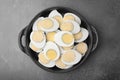 Fresh hard boiled eggs on brown table, top view