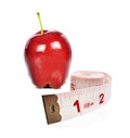 Fresh healthy apple and tape measure on white