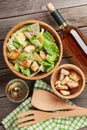 Fresh healthy caesar salad and white wine Royalty Free Stock Photo