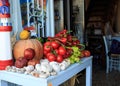 Fresh healthy colorful vegetables on wooden table on the street, Greece