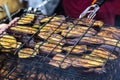 Fresh healthy eggplant or aubergine preparing on a barbecue grill over charcoal. Grilled aubergines eggplants slices. Vegetarian,