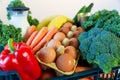 Fresh healthy groceries and vegetables from supermarket in green tray box. Food delivery service