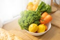 Fresh healthy organic vegetable on kitchen counter. Lemon, carrot, lettuce and more. Eating diet vitamin nutrition. Food health Royalty Free Stock Photo