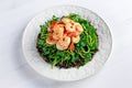 Fresh Healthy Prawns black rice salad on white plate Royalty Free Stock Photo