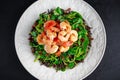 Fresh Healthy Prawns black rice salad on white plate Royalty Free Stock Photo