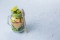 Fresh healthy salad in glass jar and ingredients Royalty Free Stock Photo