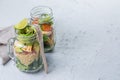 Fresh healthy salad in glass jar and ingredients Royalty Free Stock Photo