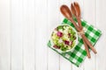 Fresh healthy salad and kitchen utensils Royalty Free Stock Photo