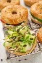 Fresh healthy sandwiches with seeded bagel, slad and cotage cheese