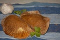 Fresh healthy whole-grain salted patties stuffed with garlic-flavored chicken and parsley nuanced with edible golden gold
