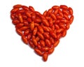 Fresh heart-shaped goji berries isolated on white background close-up