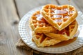 Fresh heart shaped waffles. Valentine's day breakfast treat