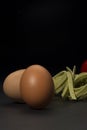 Fresh hens eggs and dried tagliatelle pasta Royalty Free Stock Photo