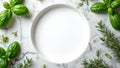 Fresh herbs frame circular space on marble background Royalty Free Stock Photo