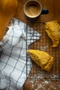 Fresh Home Baked Golden Butternut Squash Scones on a Baking Rack and Coffee for Breakfast