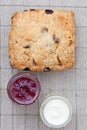 Fresh home baked scone with jam and clotted cream