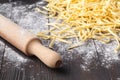Fresh home made tagliatelle on wooden table Royalty Free Stock Photo