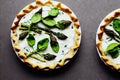 Fresh homemade aspargus tart decorated with leaves of greenery