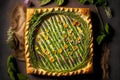 fresh homemade aspargus tart decorated with leaves of greenery