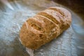 Fresh homemade bread on baking paper Royalty Free Stock Photo