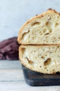 Fresh homemade bread on the blue background. Crisp. French bread. Bread at leaven. Unleavened bread