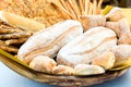 Fresh homemade bread composition in basket. Various types of wheat bakery in Sunday market. Nutrition exhibition Royalty Free Stock Photo