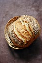 Fresh homemade bread on a dark background. Crisp. French bread. Bread at leaven.