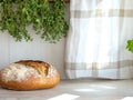 Fresh homemade bread and herbs in rustic kitchen Royalty Free Stock Photo