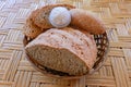 Fresh homemade bread made of wheat and rye flour. Sliced bread in a wicker basket. Fresh homemade bread made of wheat and rye flou Royalty Free Stock Photo