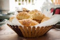 Fresh homemade bread rolls with sesam seed in basket on wooden t Royalty Free Stock Photo