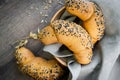 Fresh homemade bread rolls with sesam seed on table Royalty Free Stock Photo