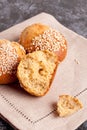 Fresh homemade bread rolls with sesam seed on table Royalty Free Stock Photo
