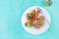 Fresh homemade chicken liver pate on bread and tomatoes salad. Royalty Free Stock Photo