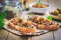 Fresh homemade chicken liver pate on ciabatta bread with roasted onions and olives Royalty Free Stock Photo