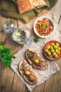 Fresh homemade chicken liver pate on ciabatta bread with roasted onions and olives Royalty Free Stock Photo