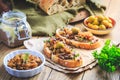 Fresh homemade chicken liver pate on ciabatta bread with roasted onions and olives Royalty Free Stock Photo