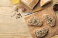 Fresh homemade chicken liver pate with herbs for bread on a natural wooden table. A sandwich. top view Royalty Free Stock Photo