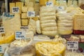 Fresh homemade cottage cheese and cheese are sold at the street market. Close-up