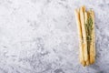 Fresh homemade crispy bread sticks with thyme and sea salt on a gray concrete background herbs. selective focus Royalty Free Stock Photo