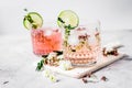 fresh homemade drink with flowers and lime on kitchen background Royalty Free Stock Photo