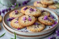 Fresh Homemade Lavender Cookies on Rustic Ceramic Plate with Purple Flowers Decoration