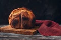 Fresh homemade loaf of bread with crispy toasted crust. Selective focus, copy space