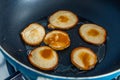 Fresh homemade pancakes flapjacks cooking on the hot pan