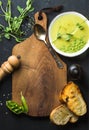 Fresh homemade pea cream soup with bread, copy space Royalty Free Stock Photo