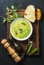 Fresh homemade pea cream soup served with grilled bread Royalty Free Stock Photo