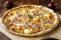 Fresh homemade Pizza with red onion rings and hollandaise sauce Royalty Free Stock Photo