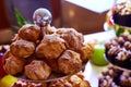 Fresh homemade profiteroles with cream pastry.