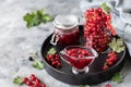 Fresh homemade red currant jam or sauce in a jar, selective focus. Place for text. Copy space Royalty Free Stock Photo