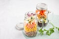 Fresh homemade salad in jars with quinoa, chickpeas and organic Royalty Free Stock Photo